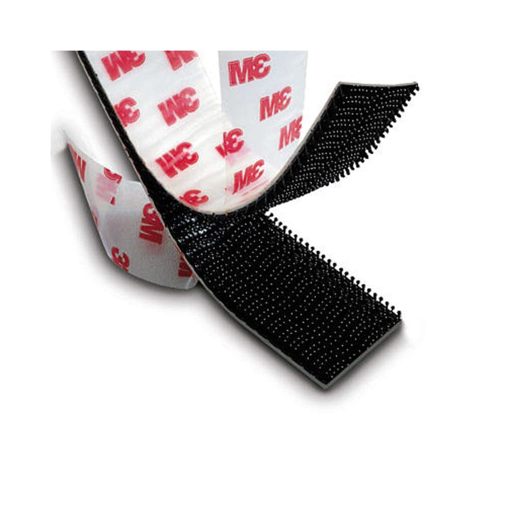 3M Dual Lock strip with the clear liner peeling away, liner printed with red 3M logos
