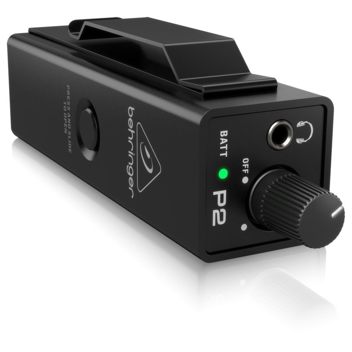 Behringer P2 in-ear monitor amp at an angle, showing belt clip, level knob, battery LED and 3.5mm output