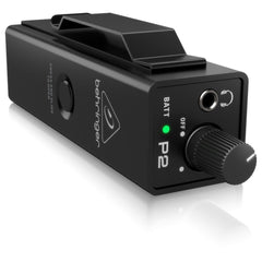 Behringer P2 in-ear monitor amp at an angle, showing belt clip, level knob, battery LED and 3.5mm output