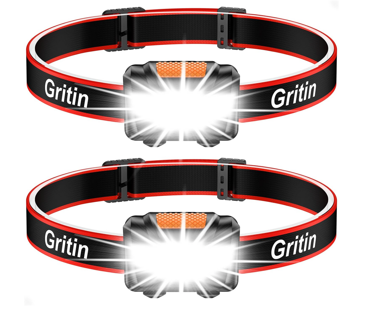 Two Gritin COB LED head torches switched on, mounted on black elastic headbands with red edging and Gritin branding