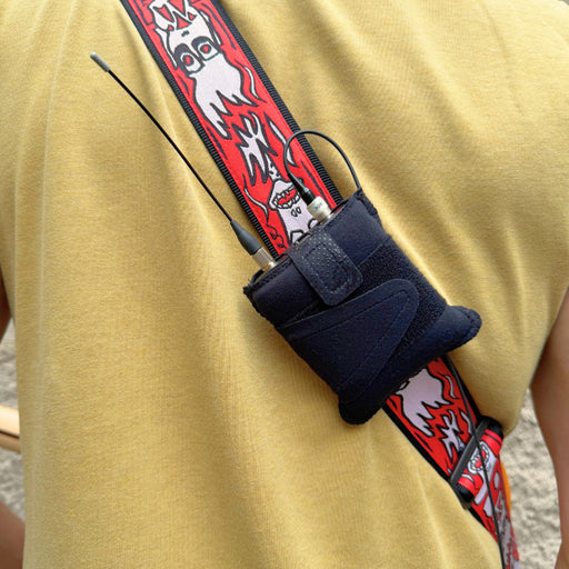 Viviana Stage Strap holding a wireless transmitter on a guitar strap