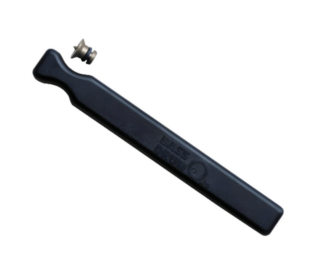 Bass Drum O's hole cutter: black cutting bar with its small metal pivot peg lying beside it