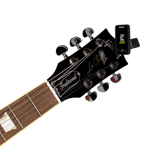 D'Addario Eclipse PW-CT-27 tuner clipped behind an electric guitar headstock, display angled towards the player