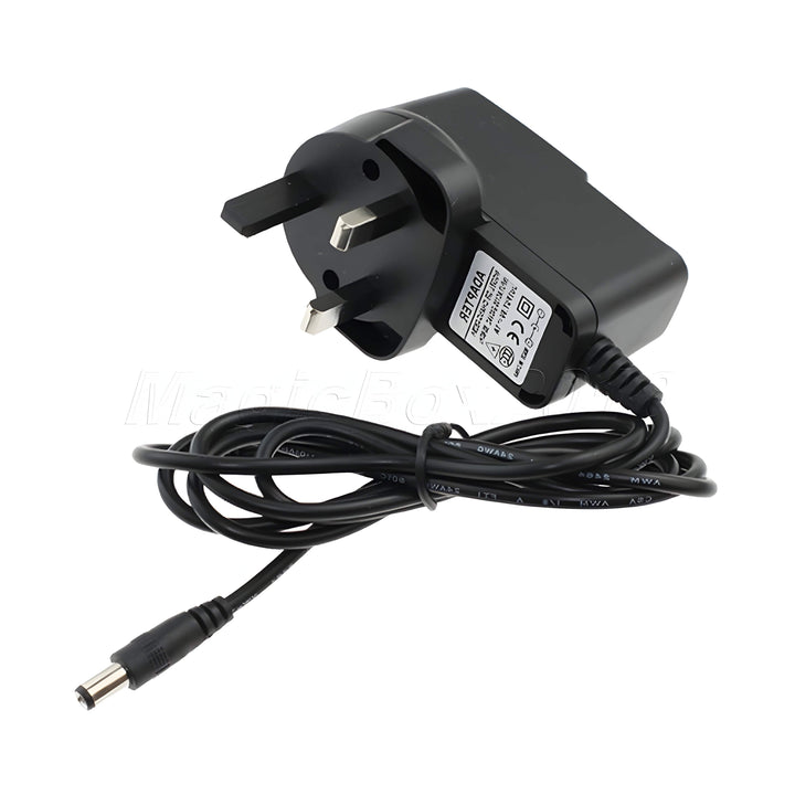 Guitar Man GMP02 9V DC pedal power supply: black UK plug-in adaptor with coiled lead and barrel plug