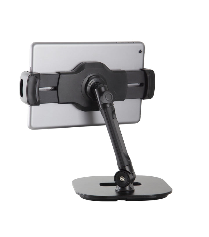 Rear view of the K&M 19800 stand holding a silver tablet, showing the bracket, arm and ball joint above the base