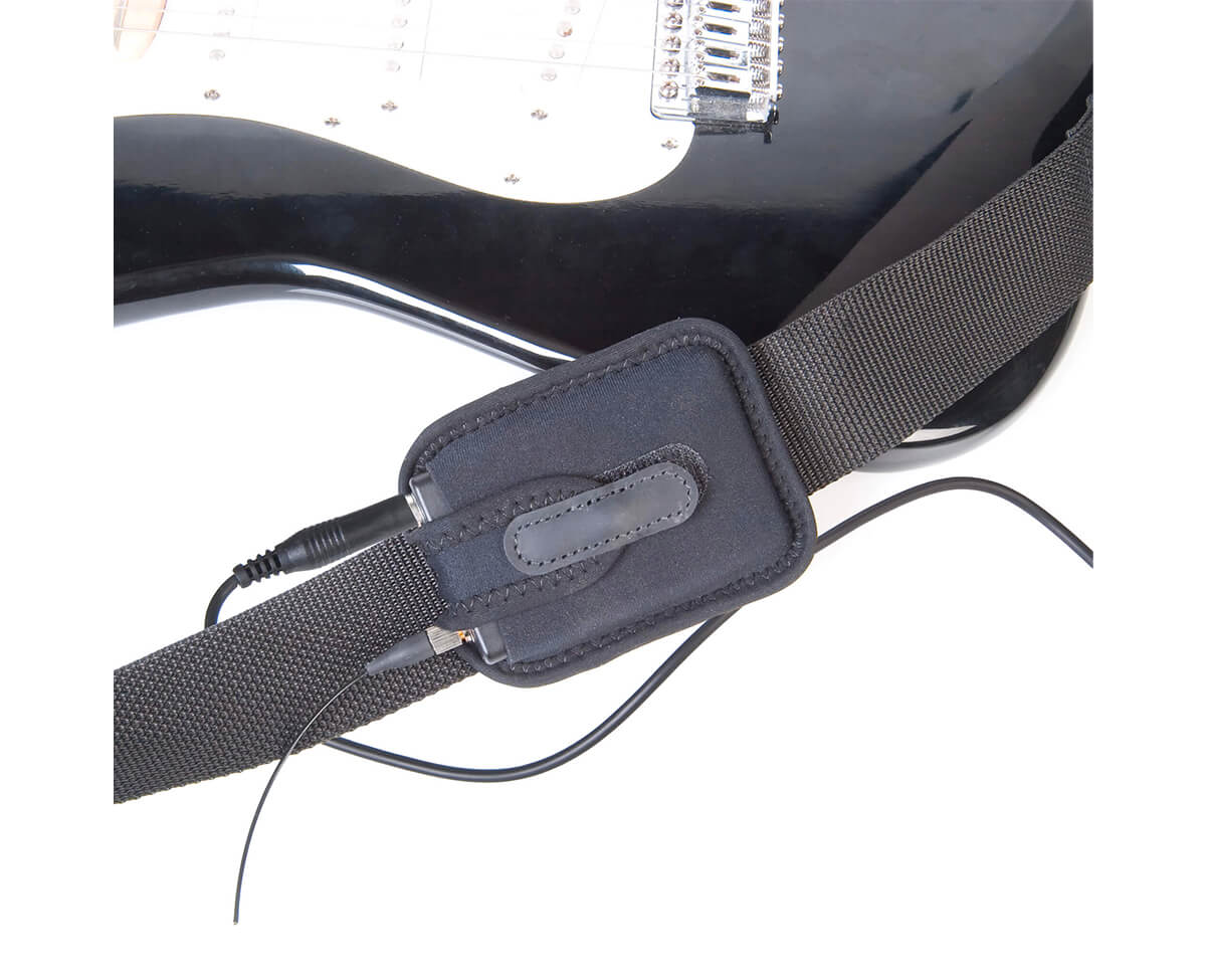 Neotech Wireless Performance Pouch fixed to the strap of a black electric guitar, with cables running from the transmitter
