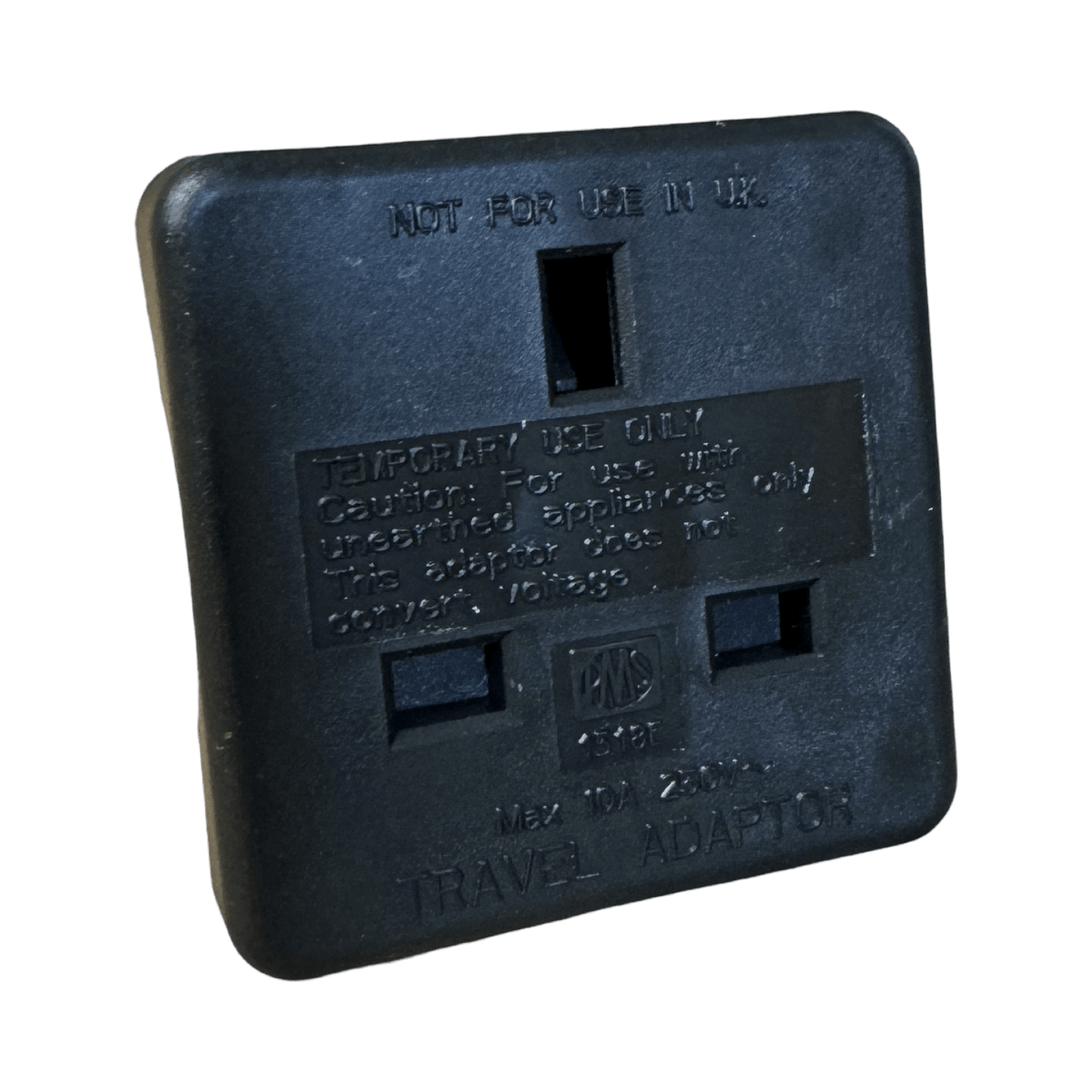 UK 3-pin socket face of the black Pro-Elec UK to US adaptor, marked Not for use in UK and Temporary use only