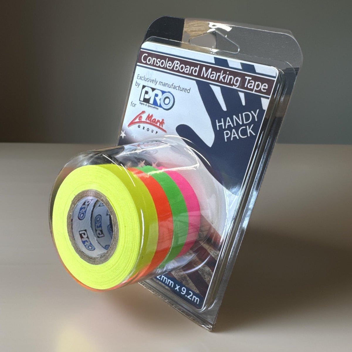 Side view of the console tape blister pack showing the stacked fluorescent rolls and the 9.2m roll size