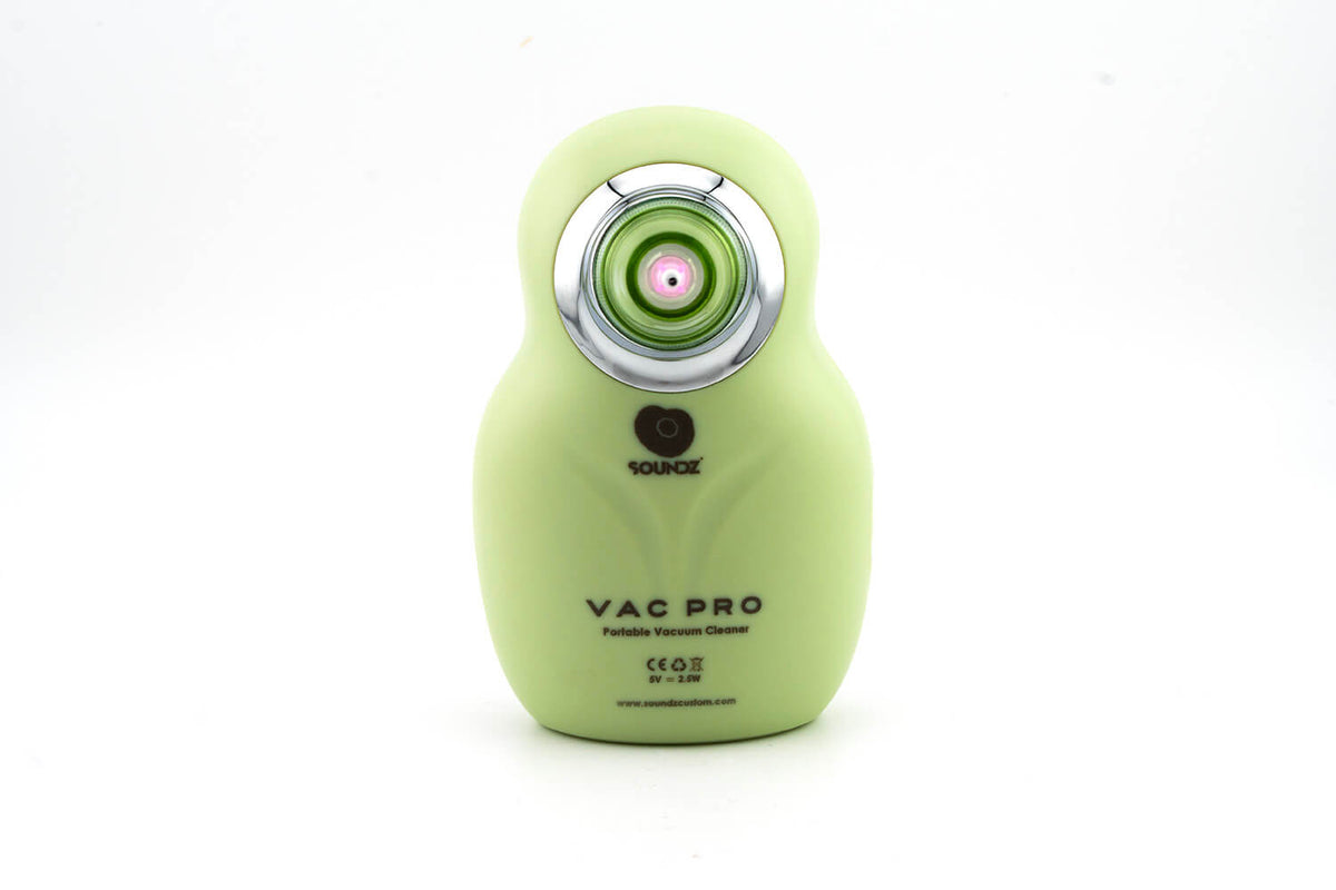 Front of the green Soundz Vac-Pro portable vacuum cleaner showing the logo and chrome nozzle ring