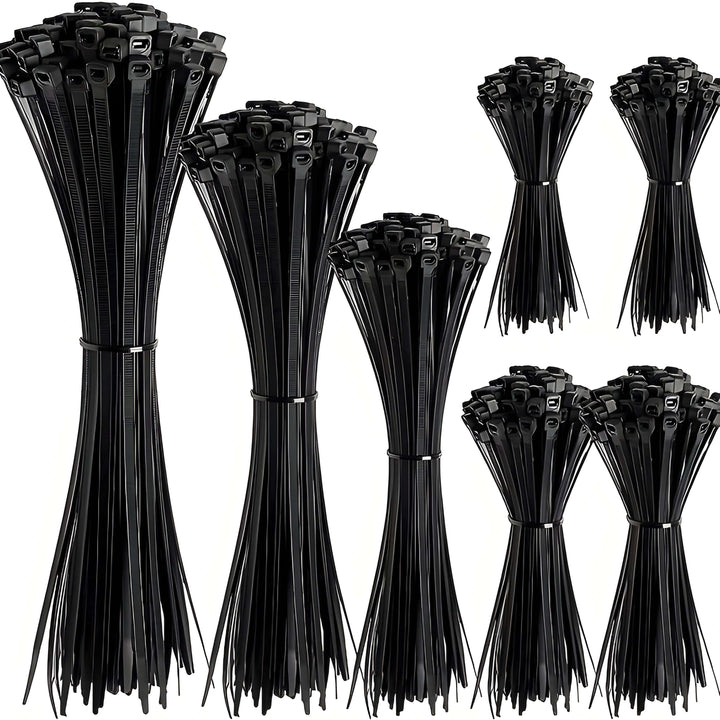 Bundles of black plastic cable ties in several lengths laid side by side