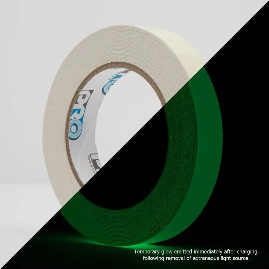 Pro Glow tape split view, the roll in daylight on one side and glowing green in the dark after charging on the other