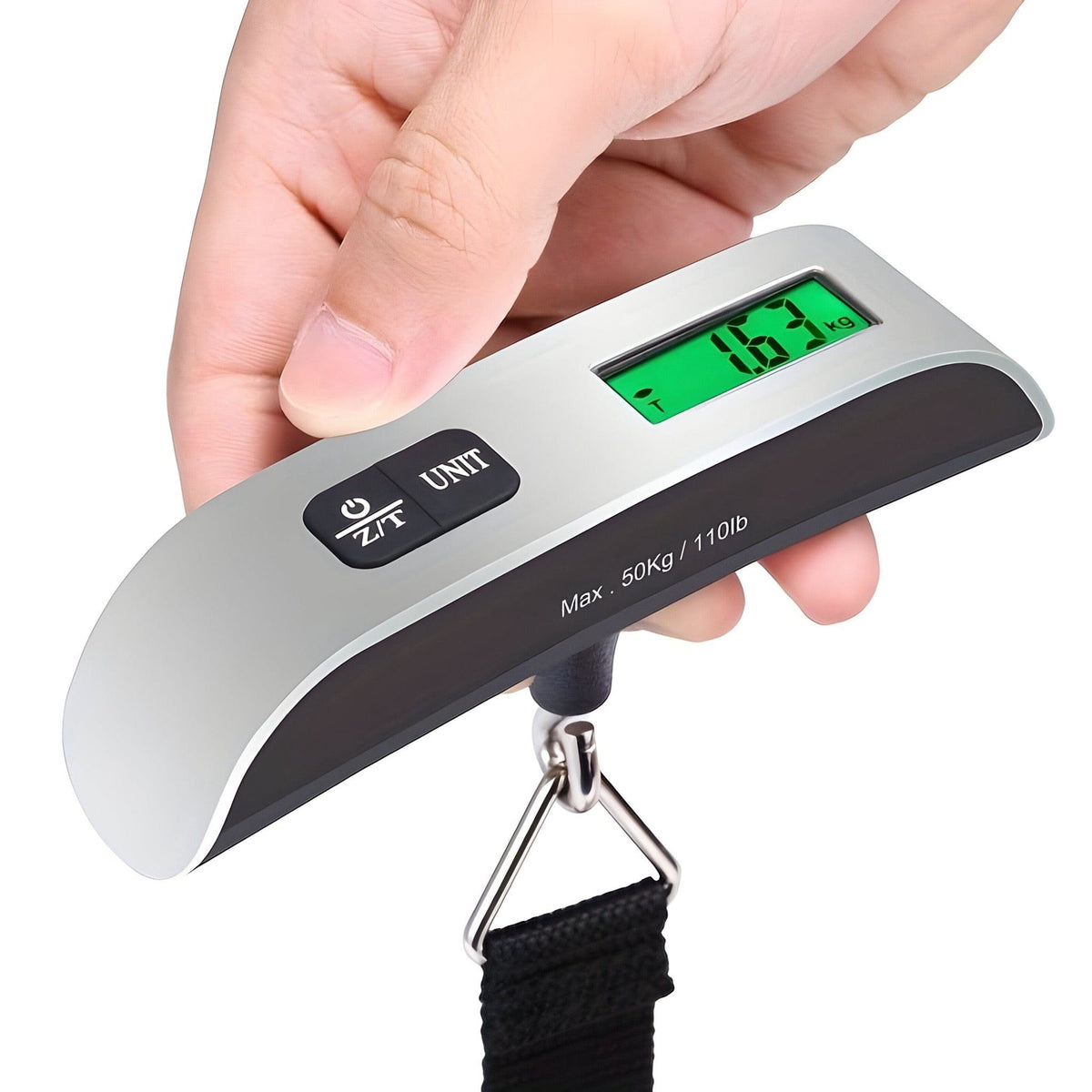 Hand holding the digital luggage scale by its grip, display reading in kg, Max 50kg / 110lb printed on the body