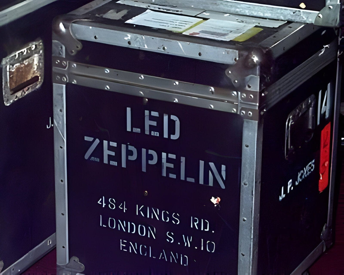 Vintage black road case with white stencilled lettering, an example of stencilled case marking