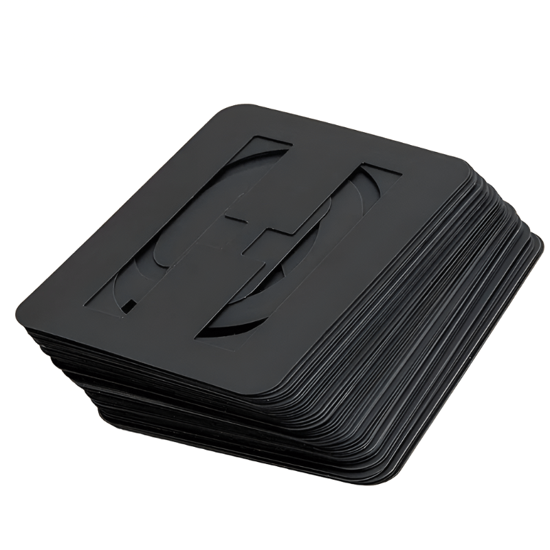 Stack of black plastic letter stencils from the roadcase stencil kit, shown at an angle