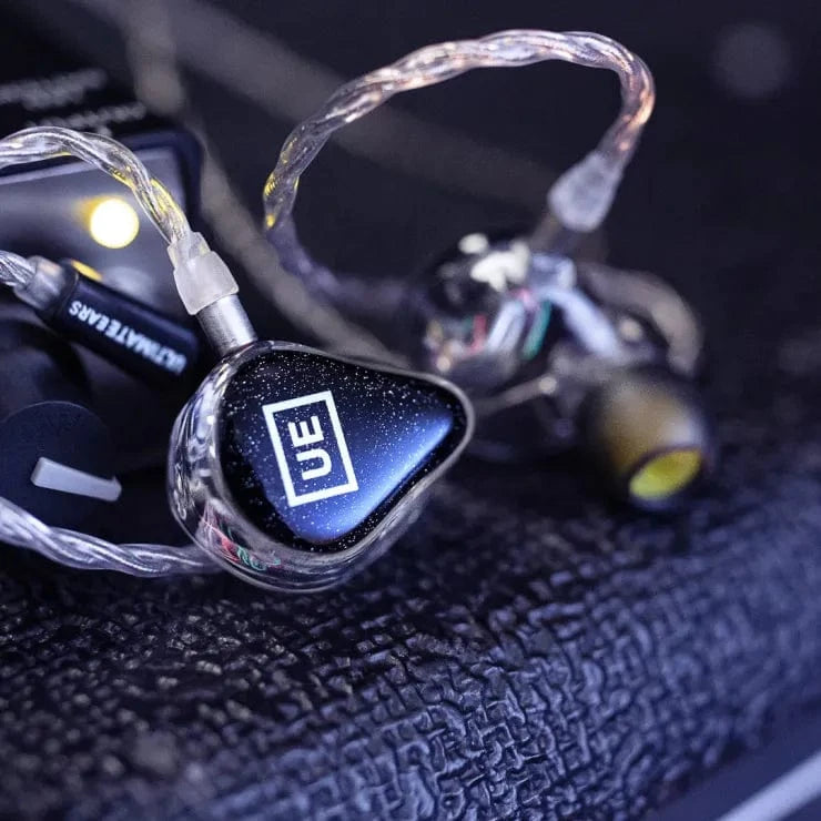 Close-up of the UE 250's sparkly Black Galaxy faceplate with UE logo and clear braided cable