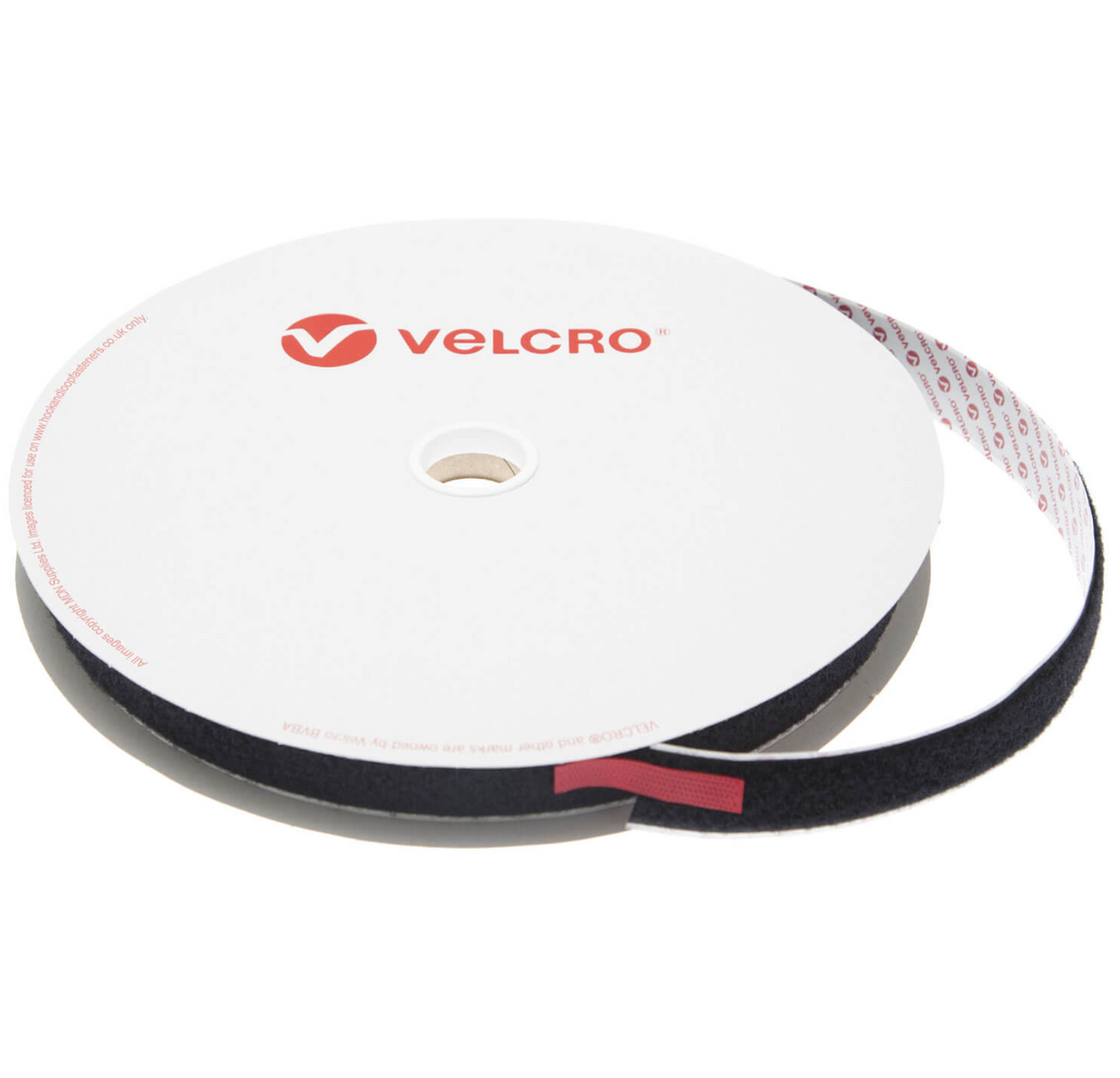 VELCRO Brand 25mm black self-adhesive loop tape on a white reel, the soft loop face unwound beside the red end tab